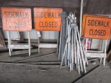 ALL SIGNAGE, FRAMES, SAFETY CONES AND BARRIERS