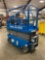 GENIE GS1930 SCISSOR LIFT, SELF PROPELLED, 19' PLATFORM HEIGHT, BUILT IN BATTERY CHARGER, SLIDE OUT