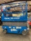 GENIE GS1930 SCISSOR LIFT, SELF PROPELLED, 19' PLATFORM HEIGHT, BUILT IN BATTERY CHARGER, SLIDE OUT