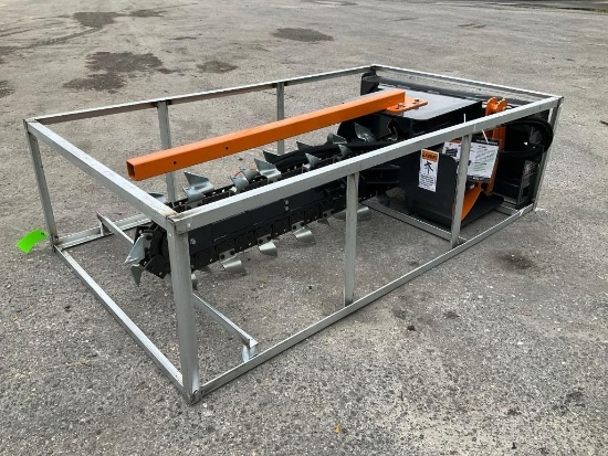 UNUSED 2025 WOLVERINE TRENCHER ATTACHMENT MODEL TCR-12-48H FOR UNIVERSAL SKID STEER ( **PLEASE NOTE