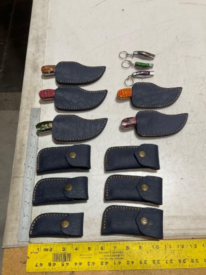 UNUSED (14) HANDMADE DAMASCUS KNIVES IN MOLD PROOF LEATHER SHEATHS, ASSORTED SIZES AND COLORS, ST...