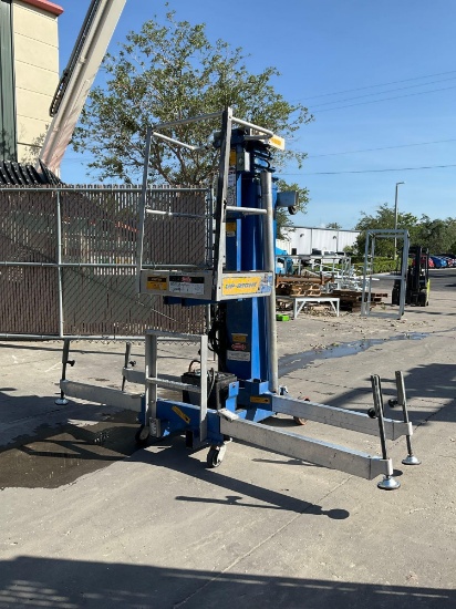 UPRIGHT UL-24 ELECTRIC MAN LIFT WITH OUTRIGGERS AND DEEP CYCLE CHARGER , APPROX MAX PLATFORM HEIGHT