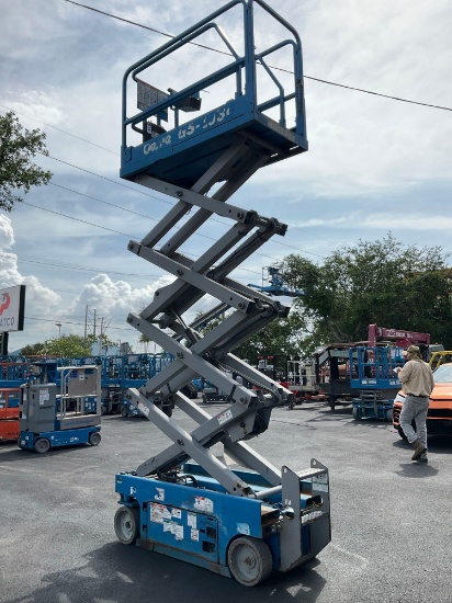 GENIE SCISSOR LIFT MODEL GS1930, ELECTRIC, APPROX MAX PLATFORM HEIGHT 19FT, BUILT IN BATTERY CHAR...