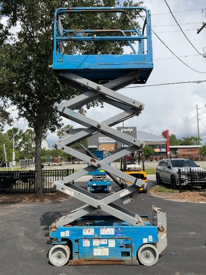 GENIE SCISSOR LIFT MODEL GS1930, ELECTRIC, APPROX MAX PLATFORM HEIGHT 19FT, BUILT IN BATTERY CH