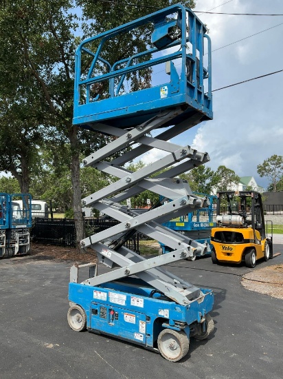 GENIE SCISSOR LIFT MODEL GS1930, ELECTRIC, APPROX MAX PLATFORM HEIGHT 19FT, BUILT IN BATTERY CHAR...