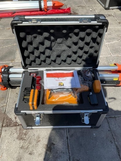 UNUSED SELF-LEVELING ROTARY LASER IN CARRYING CASE , OPERATING MANUAL MEASURING STICK & STAND INC...