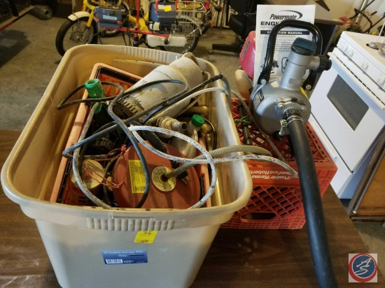 Powermate Engine Pump with operation manual, and large tote containing hose, pump, and etc