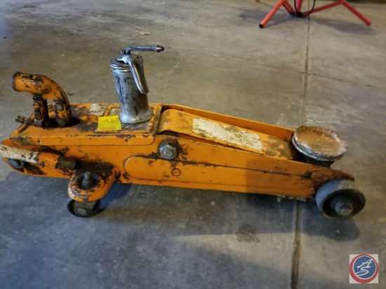 car jack with handle and vintage oil can