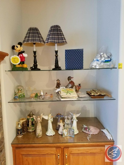 Contents of shelves to include; angel, duck and Mickey Mouse figurines, floral wall hangings, (2)