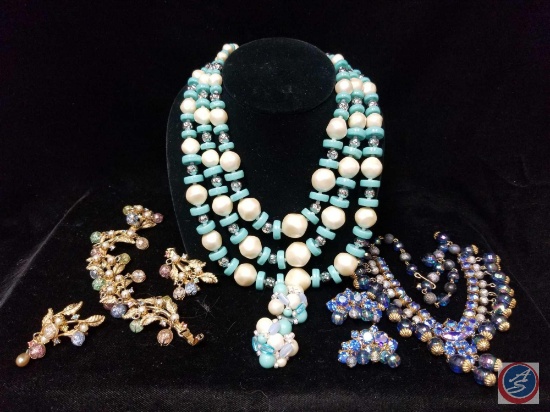 (2) beaded multi strand necklaces with matching earrings, and metal beaded clasp bracelet with