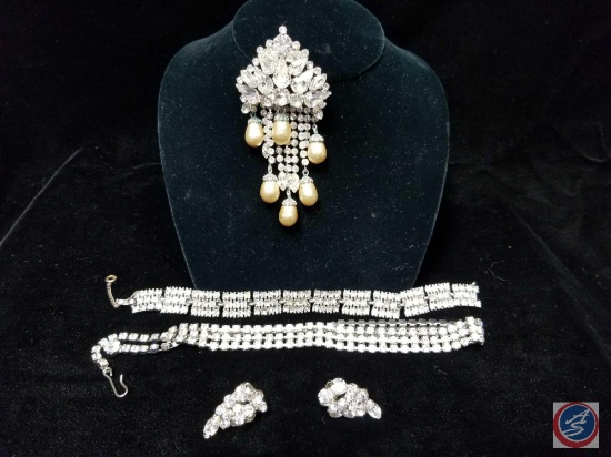 Large rhinestone and pearl brooch with (2) clasp bracelets and rhinestone clip on earrings