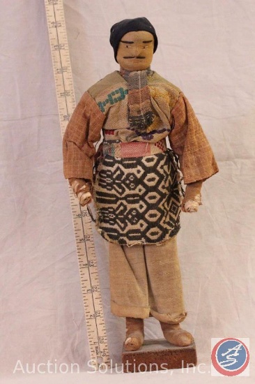 NATIVE DOLL, 12" tall man doll, cloth face and body, on wood base. No marks or tags.