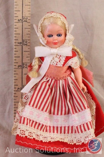 CELLULOID/PLASTIC DOLL, 6" tall, doll is jointed, blond wig in pigtails, native costume, white