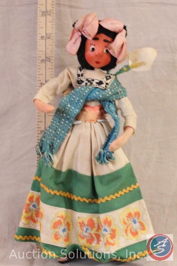 FOREIGN DOLL, 9.5" tall, cloth head and body, dressed in native costume. No marks or tags.