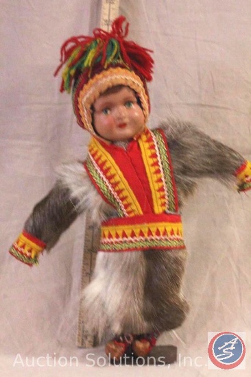 COMPOSITION/PLASTIC DOLL, 13" tall, dressed in fur outfit (fur is like deer or moose hide), painted