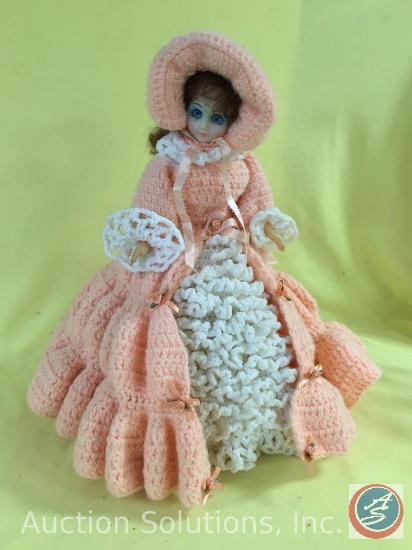 HANDCRAFTED DOLL, 15" tall on wood stand, crochet dress and cloak.