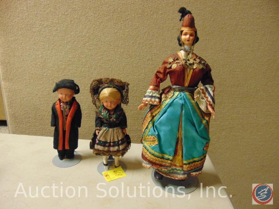 [3] FOREIGN DOLLS: 13" tall, felt/cloth face, molded plastic hands, foreign costume. Tag states: