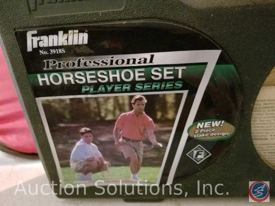 Franklin professional horseshoe set in original packaging, and variety of tennis rackets