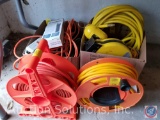 (2) boxes containing industrial extension cords, and (2) extension cord reels