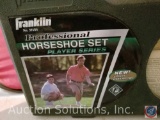 Franklin professional horseshoe set in original packaging, and variety of tennis rackets