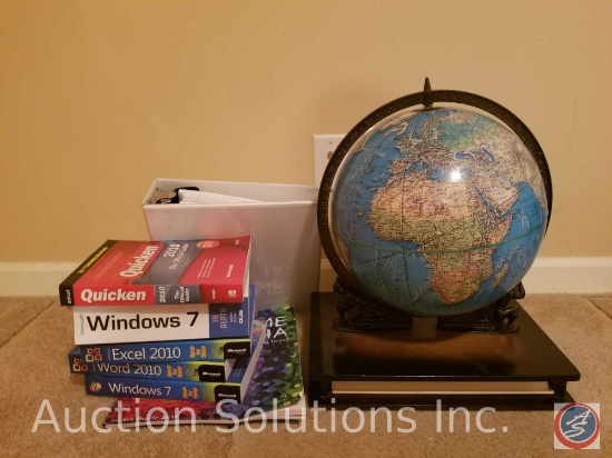 Assorted software books, Atlas and globe display