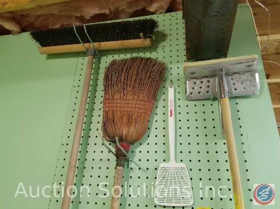 set of wood saw horses, roller stand, brooms, mop, dust pan and more