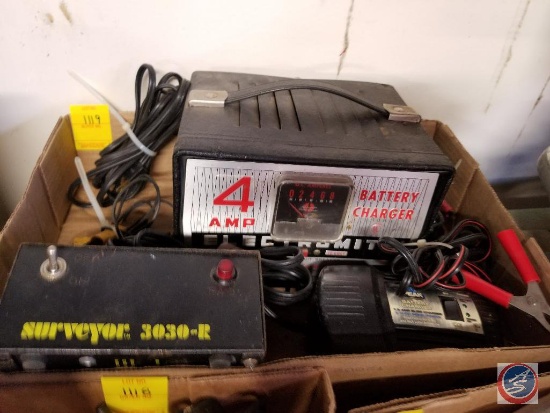 Flat containing Schumacher Electric Corp 4 amp battery charger with automatic circuit breaker, and