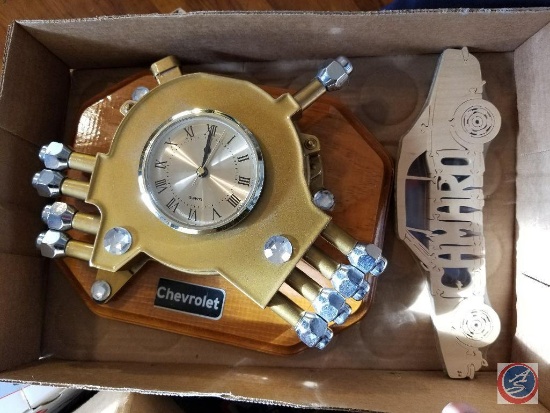 Flat containing laser cut Camaro shaped wood puzzle, and a Chevy clock