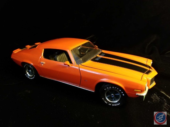 Ertl die cast Chevy Camaro, orange in color