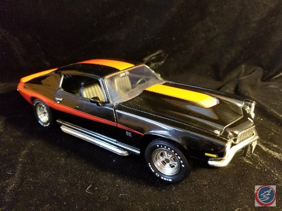 Die cast Camaro, black in color with red racing stripes