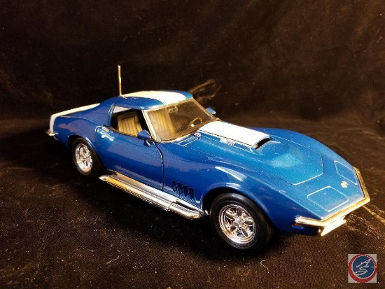 Die cast Stingray Corvette, blue in color with white racing stripe