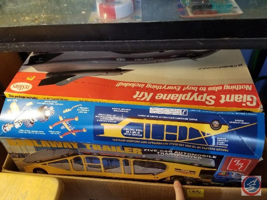 Large box containing models including unassembled Giant Sky Plane - Haul Away five car trailer - V8