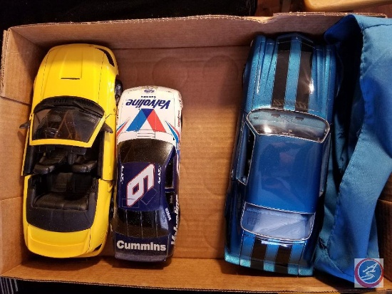 Flat containing (3) die cast cars including 2000 yellow Mustang Convertible GT - Valvoline race car