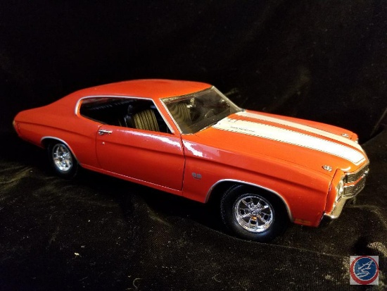 Die cast Chevelle SS, red in color with white stripes