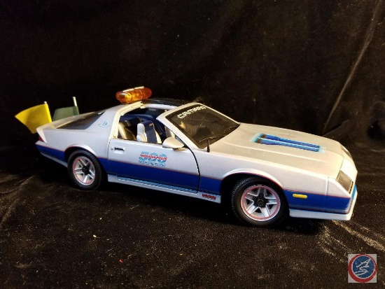 Indy 500 die cast Camaro and 1982 Camaro silver in color with T top and flags
