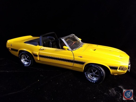 Die cast Mustang Cobra GT 500, yellow in color