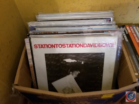 Vinyl records collection including David Bowie, Aerosmith, BTO, and more