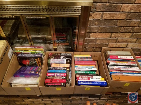 (4) boxes of assorted books including home improvement books and novels