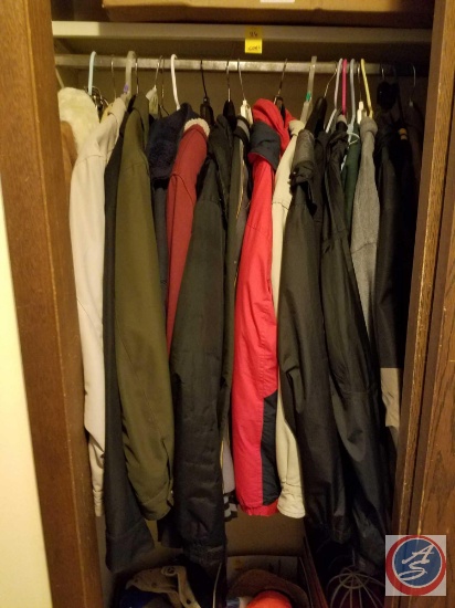Assorted mens coats, box of mens gloves and scarves (hanging in front hall closet)