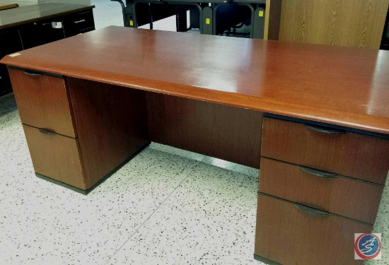 Cherry wood desk w/ [5] drawers measuring 5.5ftx3ftx2.5ft