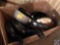 Box containing sauce pans, skillets, and assorted lids