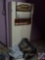 2-Door Laminate Cabinet; Basket of Linens and [2] Laundry Signs