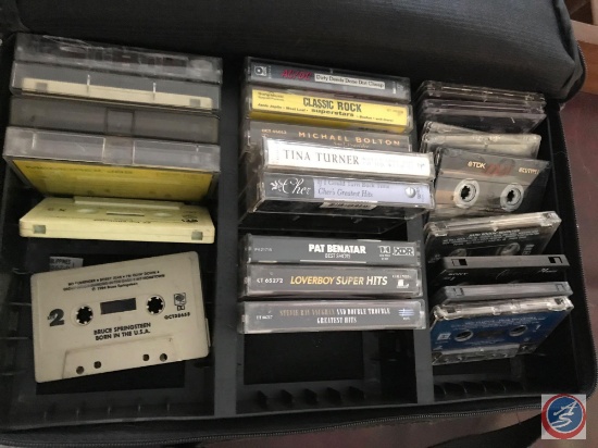 Case logic travel case for music cassettes and an assortment of cassettes