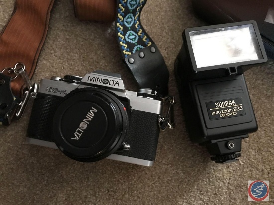 Minolta XG-M 35mm camera with a Sunpak auto zoom 933 dedicated flash