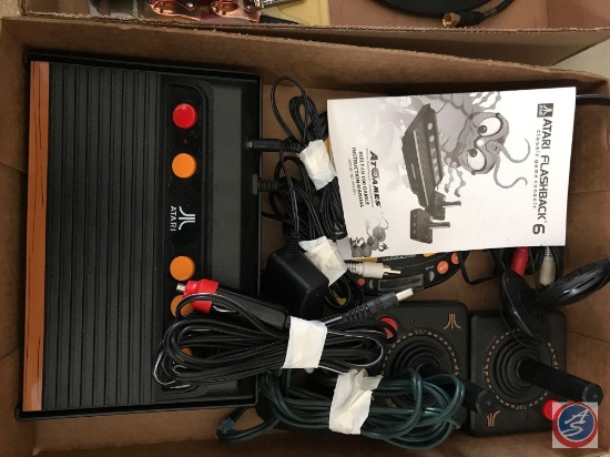 Garman Nuvi 1350, Atari Flashback 6 classic game console with 2 controllers, Sony headset, Panasonic