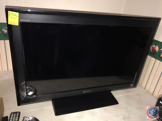 Sony Bravia 32 inch flatscreen TV on stand (Model # KDL-32L504)
