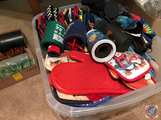 Tote containing dish towels, coozies, and hotpads