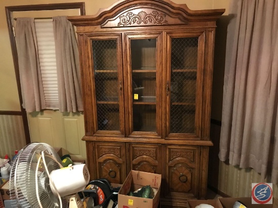 Lighted buffet with glass shelves