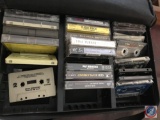 Case logic travel case for music cassettes and an assortment of cassettes