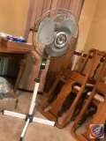 Adjustable single pedestal fan